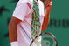PARIS - JUNE 01:  A dejected Tommy Haas of Germany heads towards defeat during the Men's Singles Fourth Round match against Roger Federer of Switzerland on day nine of the French Open at Roland Garros on June 1, 2009 in Paris, France.  (Photo by Ryan Pierse/Getty Images)