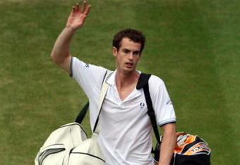 WIMBLEDON, ENGLAND - JUNE 27:  Andy Murray of Great Britain waves to the crowd after victory during the men's singles third round match against Viktor Troicki of Serbia on Day Six of the Wimbledon Lawn Tennis Championships at the All England Lawn Tennis and Croquet Club on June 27, 2009 in London, England.  (Photo by Hamish Blair/Getty Images)