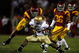 LOS ANGELES, CA - NOVEMBER 29:  Armando Allen #5 of the Nortre Dame Fighting Irsh is stopped by Taylor Mays #2, Josh Pinkard #36 and Rey Maualuga #58 of the USC Trojans during the second quarter at the Coliseum on November 29, 2008 in Los Angeles, California.  (Photo by Harry How/Getty Images)