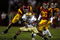 LOS ANGELES, CA - NOVEMBER 29:  Armando Allen #5 of the Nortre Dame Fighting Irsh is stopped by Taylor Mays #2, Josh Pinkard #36 and Rey Maualuga #58 of the USC Trojans during the second quarter at the Coliseum on November 29, 2008 in Los Angeles, California.  (Photo by Harry How/Getty Images)