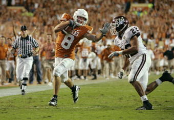 AUSTIN, TX - NOVEMBER 27:  Wide receiver Jordan Shipley #8 of the Texas Longhorns sets up a touchdown with a 68-yard gain against defensive back Trent Hunter #22 of the Texas A&M Aggies at the end of the third quarter at Darrell K Royal-Texas Memorial Stadium November 27, 2008 in Austin, Texas.  (Photo by Brian Bahr/Getty Images)