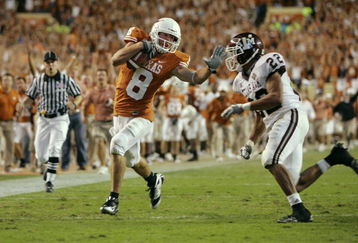 AUSTIN, TX - NOVEMBER 27:  Wide receiver Jordan Shipley #8 of the Texas Longhorns sets up a touchdown with a 68-yard gain against defensive back Trent Hunter #22 of the Texas A&M Aggies at the end of the third quarter at Darrell K Royal-Texas Memorial Stadium November 27, 2008 in Austin, Texas.  (Photo by Brian Bahr/Getty Images)