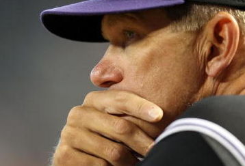 PHOENIX - APRIL 08:  Coach Jim Tracy of the Colorado Rockies looks on during the game against the Arizona Diamondbacks at Chase Field on April 8, 2009 in Phoenix, Arizona. The Rockies defeated the Diamondbacks 9-2.  (Photo by Christian Petersen/Getty Images)