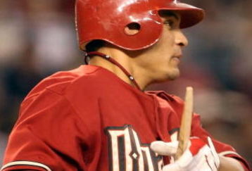 PHOENIX - JUNE 23:  Gerardo Parra #9 of the Arizona Diamondbacks hits a broken bat single against the Texas Rangers during the major league baseball game at Chase Field on June 23, 2009 in Phoenix, Arizona. The Diamondbacks defeated the Rangers 8-2. (Photo by Christian Petersen/Getty Images)