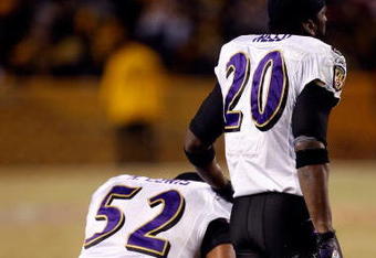 PITTSBURGH - JANUARY 18:  (L-R) Ray Lewis #52 and Ed Reed #20 of  the Baltimore Ravens look on as teammate Willis McGahee is attended to by medical personnel after McGahee was hit hard by Ryan Clark #25 of the Pittsburgh Steelers during the AFC Championship game on January 18, 2009 at Heinz Field in Pittsburgh, Pennsylvania.  (Photo by Streeter Lecka/Getty Images)