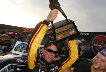 MEMPHIS, TN - JUNE 27: Ron Hornaday Jr., driver of the #33 Longhorn Chevrolet celebrates winning the MemphisTravel.com 200 Camping World Truck Series race at the Memphis Motorsports Park on June 27, 2009 in Memphis, Tennessee.   (Photo by John Sommers II/Getty Images)