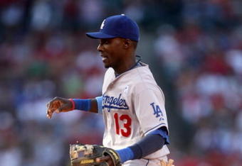 ANAHEIM, CA - JUNE 21:  Second baseman Orlando Hudson #13 of the Los Angeles Dodgers makes a play on a ground ball during the game with the Los Angeles Angels of Anaheim on June 21, 2009 at Angel Stadium in Anaheim, California.   The Dodgers won 5-3.  (Photo by Stephen Dunn/Getty Images)