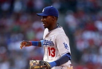 ANAHEIM, CA - JUNE 21:  Second baseman Orlando Hudson #13 of the Los Angeles Dodgers makes a play on a ground ball during the game with the Los Angeles Angels of Anaheim on June 21, 2009 at Angel Stadium in Anaheim, California.   The Dodgers won 5-3.  (Photo by Stephen Dunn/Getty Images)