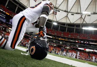 ATLANTA - OCTOBER 12:  Charles Tillman #33 of the Chicago Bears kneels on the sidelines during the game against the Atlanta Falcons at the Georgia Dome on October 12, 2008 in Atlanta, Georgia.  (Photo by Kevin C. Cox/Getty Images)