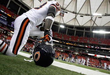 ATLANTA - OCTOBER 12:  Charles Tillman #33 of the Chicago Bears kneels on the sidelines during the game against the Atlanta Falcons at the Georgia Dome on October 12, 2008 in Atlanta, Georgia.  (Photo by Kevin C. Cox/Getty Images)