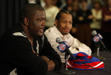 AUBURN HILLS, MI - NOVEMBER 04: President of Basketball Operations Joe Dumars of the Detroit Pistons introduces Allen Iverson #1 at press conference after being traded from the Denver Nuggets on November 4, 2008 at the Palace of Auburn Hills in Auburn Hills, Michigan. NOTE TO USER: User expressly acknowledges and agrees that, by downloading and or using this photograph, User is consenting to the terms and conditions of the Getty Images License Agreement.  (Photo by Gregory Shamus/Getty Images)