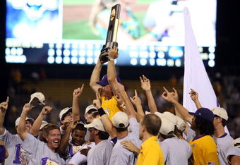 OMAHA, NE - JUNE 24:  Head coach Paul Mainieri of the Louisiana State University Tigers is held up by his team after defeating the Texas Longhorns during Game 3 of the 2009 NCAA College World Series at Rosenblatt Stadium on June 24, 2009 in Omaha, Nebraska. The Tigers defeated the Longhorns 11-4 to win the national title.  (Photo by Elsa/Getty Images)