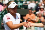 WIMBLEDON, ENGLAND - JUNE 27:  Melanie Oudin of USA (L) shakes hands with Jelena Jankovic of Serbia after the women's third round match on Day Six of the Wimbledon Lawn Tennis Championships at the All England Lawn Tennis and Croquet Club on June 27, 2009 in London, England.  (Photo by Ian Walton/Getty Images)
