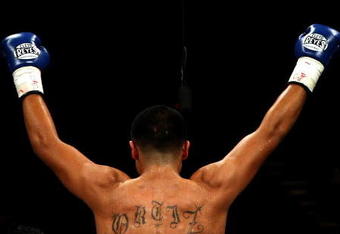 LAS VEGAS - DECEMBER 06:  Victor Ortiz reacts after defeating Jeffrey Resto by a second round TKO during their NABO junior welterweight title fight at the MGM Grand Garden Arena December 6, 2008 in Las Vegas, Nevada.  (Photo by Jed Jacobsohn/Getty Images)