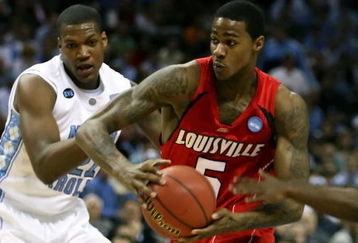 CHARLOTTE, NC - MARCH 29:  Earl Clark #5 of the Louisville Cardinals drives on Deon Thompson #21 of the North Carolina Tar Heels during the 2008 NCAA Men's East Regional Final at Bobcats Arena on March 29, 2008 in Charlotte, North Carolina.  (Photo by Kevin C. Cox/Getty Images)