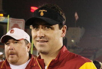 LOS ANGELES - NOVEMBER 29:  Assistant coach Steve Sarkisian of the USC Trojans smiles as he walks on the field after the game against the Notre Dame Fighting Irish on November 29, 2008 at the Los Angeles Memorial Coliseum in Los Angeles, California.  USC won 38-3.  (Photo by Jeff Golden/Getty Images)