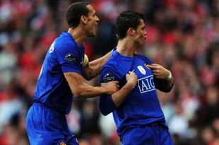 LONDON, ENGLAND - MAY 05:  Cristiano Ronaldo (#7) of Manchester United celebrates scoring the second goal of the game with Rio Ferdinand during the UEFA Champions League Semi Final Second Leg match between Arsenal and Manchester United at Emirates Stadium on May 5, 2009 in London, England.  (Photo by Shaun Botterill/Getty Images)