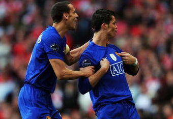 LONDON, ENGLAND - MAY 05:  Cristiano Ronaldo (#7) of Manchester United celebrates scoring the second goal of the game with Rio Ferdinand during the UEFA Champions League Semi Final Second Leg match between Arsenal and Manchester United at Emirates Stadium on May 5, 2009 in London, England.  (Photo by Shaun Botterill/Getty Images)