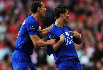 LONDON, ENGLAND - MAY 05:  Cristiano Ronaldo (#7) of Manchester United celebrates scoring the second goal of the game with Rio Ferdinand during the UEFA Champions League Semi Final Second Leg match between Arsenal and Manchester United at Emirates Stadium on May 5, 2009 in London, England.  (Photo by Shaun Botterill/Getty Images)