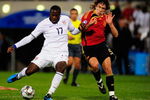 BLOEMFONTEIN, SOUTH AFRICA - JUNE 24:  Jozy Altidore of USA beats the challenge of Carles Puyol of Spain to score a goal  during the FIFA Confederations Cup Semi Final match between Spain and USA at Free State Stadium on June 24, 2009 in Bloemfontein, South Africa.  (Photo by Jamie McDonald/Getty Images)