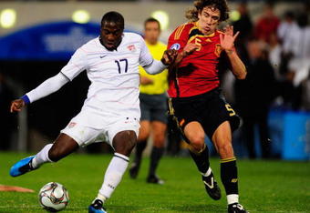 BLOEMFONTEIN, SOUTH AFRICA - JUNE 24:  Jozy Altidore of USA beats the challenge of Carles Puyol of Spain to score a goal  during the FIFA Confederations Cup Semi Final match between Spain and USA at Free State Stadium on June 24, 2009 in Bloemfontein, South Africa.  (Photo by Jamie McDonald/Getty Images)