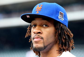 NEW YORK - JUNE 26:  New York Knicks 2009 first round draft pick Jordan Hill looks on as as the New York Mets take batting practice before playing the New York Yankees on June 26, 2009 at Citi Field in the Flushing neighborhood of the Queens borough of New York City.  (Photo by Jim McIsaac/Getty Images)
