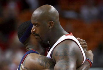 MIAMI - FEBRUARY 01:  Shaquille O'Neal #32 of the Miami Heat greets LeBron James #23 of the Cleveland Cavaliers before the game at American Airlines Arena February 1, 2007 in Miami, Florida. NOTE TO USER: User expressly acknowledges and agrees that, by downloading and or using this photograph, User is consenting to the terms and conditions of the Getty Images License Agreement.  (Photo by Doug Benc/Getty Images)