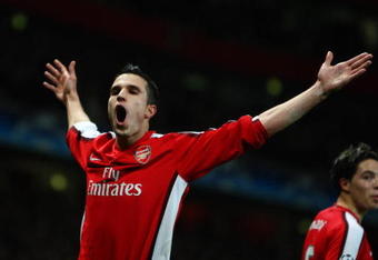 LONDON - FEBRUARY 24:  Robin Van Persie of Arsenal ceelbrates scoring from the penalty spot for Arsenals first goal during the UEFA Champions League First knockout round, First Leg match between Arsenal and A.S. Roma at Emirates Stadium on February 24, 2009 in London, England.  (Photo by Jamie McDonald/Getty Images)