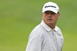 CROMWELL, CT - JUNE 27: Paul Goydos looks over his shoulder on the 18th green during round three of the 2009 Travelers Championship at TPC River Highlands on June 27, 2009 in Cromwell, Connecticut. (Photo by Jim Rogash/Getty Images)