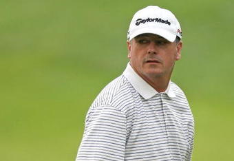 CROMWELL, CT - JUNE 27: Paul Goydos looks over his shoulder on the 18th green during round three of the 2009 Travelers Championship at TPC River Highlands on June 27, 2009 in Cromwell, Connecticut. (Photo by Jim Rogash/Getty Images)