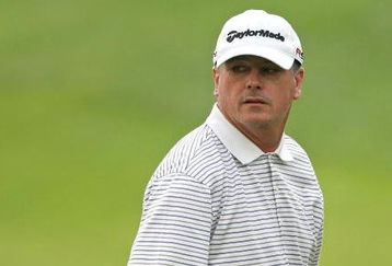 CROMWELL, CT - JUNE 27: Paul Goydos looks over his shoulder on the 18th green during round three of the 2009 Travelers Championship at TPC River Highlands on June 27, 2009 in Cromwell, Connecticut. (Photo by Jim Rogash/Getty Images)