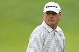 CROMWELL, CT - JUNE 27: Paul Goydos looks over his shoulder on the 18th green during round three of the 2009 Travelers Championship at TPC River Highlands on June 27, 2009 in Cromwell, Connecticut. (Photo by Jim Rogash/Getty Images)