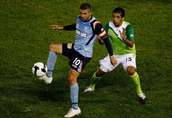 SYDNEY, AUSTRALIA - JUNE 27:  Steve Corica of Sydney competes with Fred Agius of the Fury during the match between Sydney FC and the North Queensland Fury at Toyota Stadium on June 27, 2009 in Sydney, Australia.  (Photo by Brendon Thorne/Getty Images)