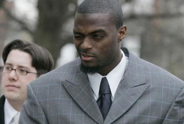 LEBANON - JANUARY 14: New York Giants wide receiver Plaxico Burress winks at a supporter as he arrives at the Lebanon County Courthouse January 14, 2009 in Lebanon, Pa.  Burress is scheduled to appear in a civil trial in a dispute with an automobile dealer over what he owes in damages to a vehicle supplied to him by the dealership. (Photo by Chris Gardner/Getty Images)