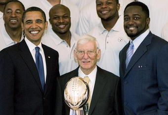 WASHINGTON  - MAY 21:  U.S. President Barack Obama (L) poses with Pittsburgh Steelers Chairman Dan Rooney (C) and Head Coach Mike Tomlin (R) during a picture with the 2009 NFL Super Bowl champion Pittsburgh Steelers in the East Room of the White House May 21, 2009 in Washington, DC.  (Photo by Aude Guerrucci-Pool/Getty Images)