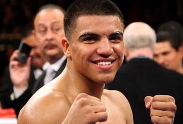 LAS VEGAS - DECEMBER 06:  Victor Ortiz reacts after defeating Jeffrey Resto by a second round TKO during their NABO junior welterweight title fight at the MGM Grand Garden Arena December 6, 2008 in Las Vegas, Nevada.  (Photo by Jed Jacobsohn/Getty Images)