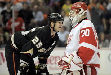 ANAHEIM, CA - MAY 05:  Goaltender Chris Osgood #30 of the Detroit Red Wings and Chris Pronger #25 of the Anaheim Ducks talk during  a break in Game Three of the Western Conference Semifinal Round of the 2009 Stanley Cup Playoffs at the Honda Center on May 5, 2009 in Anaheim, California.  (Photo by Kevork Djansezian/Getty Images)
