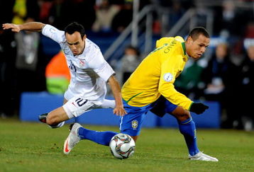 JOHANNESBURG, SOUTH AFRICA - JUNE 28: Landon Donovan of USA and Luis Fabiano of Brazil compete during the 2009 Confederations Cup final match between Brazil and USA from Ellis Park on June 28, 2009 in Johannesburg, South Africa. (Photo by Lefty Shivambu/Gallo Images/Getty Images)