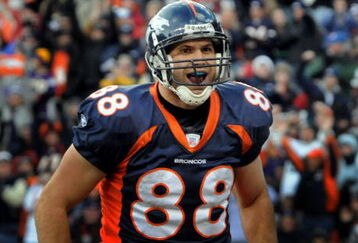 DENVER - DECEMBER 30:  Tight end Tony Scheffler #88 of the Denver Broncos is all smiles as he scores a touchdown in the second quarter of the football game against the Minnesota Vikings at Invesco Field at Mile High on December 30, 2007 in Denver, Colorado.  (Photo by Steve Dykes/Getty Images)