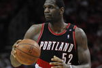 HOUSTON - APRIL 24:  Center Greg Oden #52 of the Portland Trail Blazers during play against the Houston Rockets in Game Three of the Western Conference Quarterfinals during the 2009 NBA Playoffs at Toyota Center on April 24, 2009 in Houston, Texas. NOTE TO USER: User expressly acknowledges and agrees that, by downloading and or using this photograph, User is consenting to the terms and conditions of the Getty Images License Agreement.  (Photo by Ronald Martinez/Getty Images)