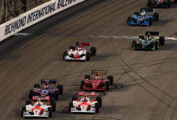 RICHMOND, VA - JUNE 27: Dario Franchitti drives the #10 Target Chip Ganassi Racing Dallara Honda off the start line during the IRL Indycar Series SunTrust Indy Challenge on June 27, 2009 at the Richmond International Speedway in Richmond, Virginia.  (Photo by Chris McGrath/Getty Images)