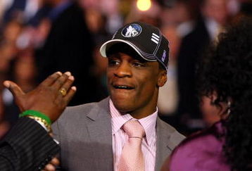 NEW YORK - JUNE 25:  Sixth overall draft pick by the Minnesota Timberwolves,  Jonny Flynn is congratulated by members of his entourage during the 2009 NBA Draft at the Wamu Theatre at Madison Square Garden June 25, 2009 in New York City. NOTE TO USER: User expressly acknowledges and agrees that, by downloading and/or using this Photograph, User is consenting to the terms and conditions of the Getty Images License Agreement.  (Photo by Jim McIsaac/Getty Images)
