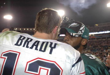 New England Patriots QB Tom Brady #12  talks with Eagles QB # 5 Donovan McNabb after the Patriots defeated the Eagles in Super Bowl XXXIX between the Philadelphia Eagles and the New England Patriots at Alltel Stadium in Jacksonville, Florida on February 6, 2005.  (Photo by Al Messerschmidt/Getty Images)