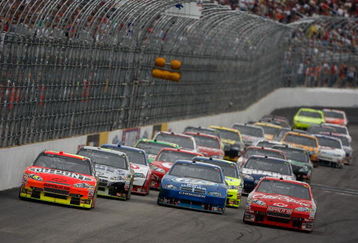 LOUDON, NH - JUNE 28:  Jeff Gordon, driver of the #24 DuPont Chevrolet leads the field during the NASCAR Sprint Cup Series LENOX Industrial Tools 301 at New Hampshire Motor Speedway on June 28, 2009 in Loudon, New Hampshire.  (Photo by Chris Graythen/Getty Images)