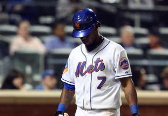 NEW YORK - MAY 11:  Jose Reyes #7 of the New York Mets walks back to the dugout after striking out in the eigth inning against the Atlanta Braves on May 11, 2009 at Citi Field in the Flushing neighborhood of the Queens borough of New York City.  (Photo by Jim McIsaac/Getty Images)