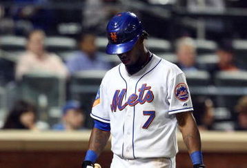 NEW YORK - MAY 11:  Jose Reyes #7 of the New York Mets walks back to the dugout after striking out in the eigth inning against the Atlanta Braves on May 11, 2009 at Citi Field in the Flushing neighborhood of the Queens borough of New York City.  (Photo by Jim McIsaac/Getty Images)