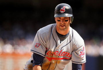 NEW YORK - APRIL 17:  Mark DeRosa #7 of the Cleveland Indians stands up after sliding safely in to third base during their game against the New York Yankees at Yankee Stadium on April 17, 2009 in the Bronx borough of New York City.  (Photo by Ezra Shaw/Getty Images)