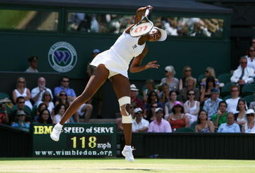 WIMBLEDON, ENGLAND - JUNE 27:  Venus Williams of USA serves during the women's singles third round match against Carla Suarezv Navarro of Spain on Day Six of the Wimbledon Lawn Tennis Championships at the All England Lawn Tennis and Croquet Club on June 27, 2009 in London, England.  (Photo by Paul Gilham/Getty Images)