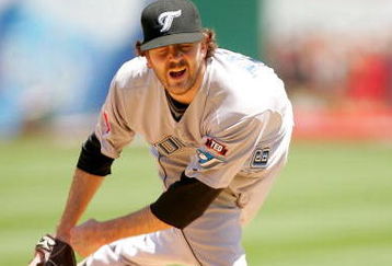 OAKLAND, CA - MAY 09:  Brian Tallet #56 of the Toronto Blue Jays pitches against the Oakland Athletics on May 9, 2009 at the Oakland Coliseum in Oakland, California.  (Photo by Ezra Shaw/Getty Images)