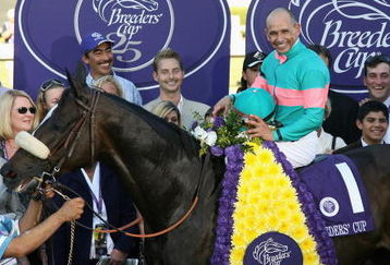 ARCADIA, CA - OCTOBER 24:  Jockey Mike Smith atop Zenyatta pose with owners and trainers in the winner's circle after winning the Breeders' Cup Ladies Classic during the Breeders' Cup World Championships at Santa Anita Park October 24, 2008 in Arcadia, California.  (Photo by Christian Petersen/Getty Images)